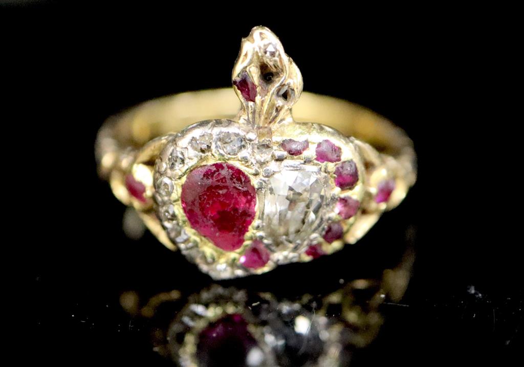 A 19th century 18ct gold, foil backed garnet? and diamond set twin hearts ring,